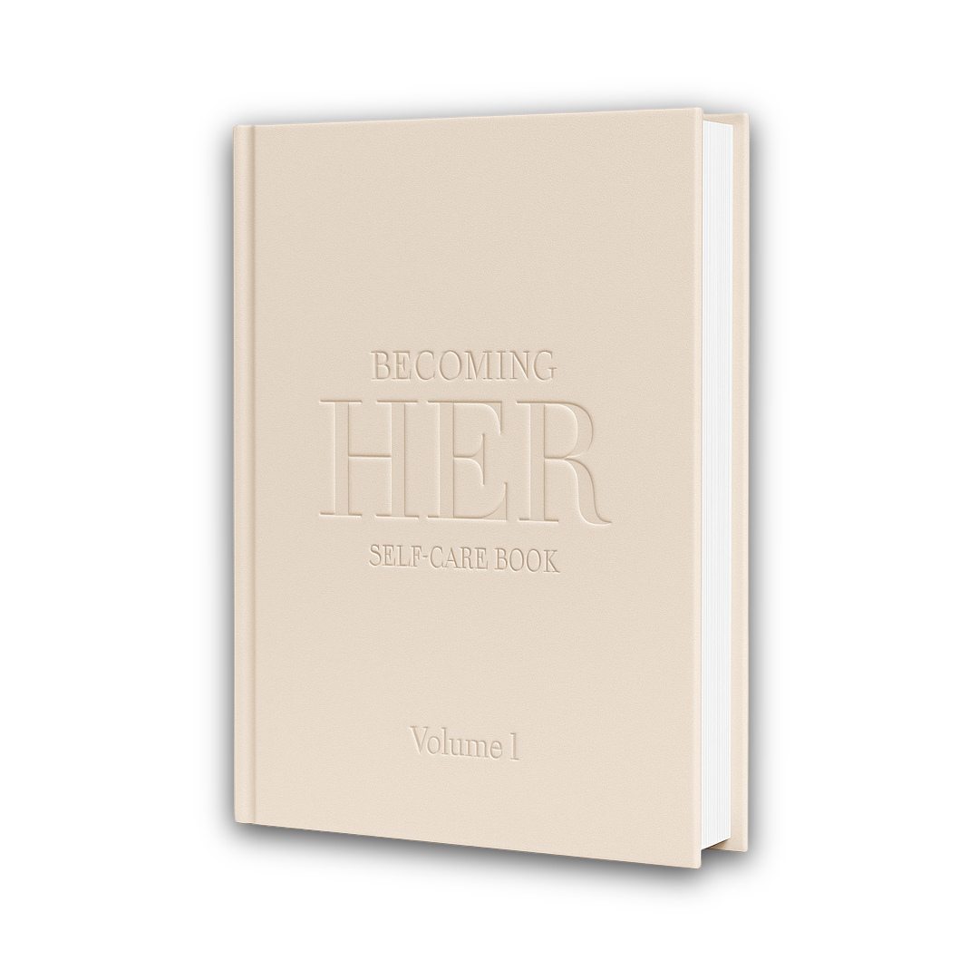 A minimalist beige hard-cover book titled “Becoming Her: Self-Care Book – Volume 1.” The design features embossed lettering on a matte textured cover, embodying a quiet-luxury aesthetic that reflects themes of self-care, femininity, and personal growth.